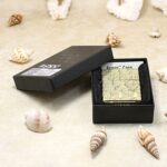 KZ159 numbered arabesque Zippo Armor lighter displayed in its original box