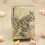 Reverse of KZ162 lighter with pine trees, rocky cliffs, waterfall, and pavilion