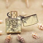 Open KZ162 Zippo Armor lighter showing the pavilion and pine-tree reverse scene