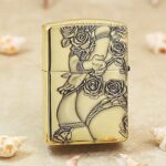 Reverse of KZ172 Zippo Armor lighter with a rear-view lady figure and roses