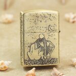 Skeleton embracing a woman under a crescent moon on the reverse of KZ174 lighter