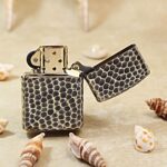 Open KZ175 Zippo Armor lighter showing the snakeskin-pattern reverse and lid