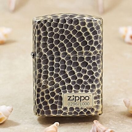 Black-and-brass snakeskin texture Zippo Armor lighter with numbered 0296 of 1000 badge