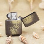 Open KZ179 Zippo lighter showing the Buddha and lotus reverse artwork
