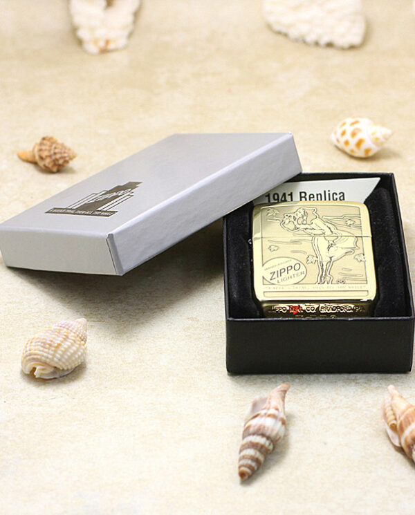 KZ183-06 Gold Zippo lighter with a vintage illustration, housed in a black presentation box and angled lid slightly open.