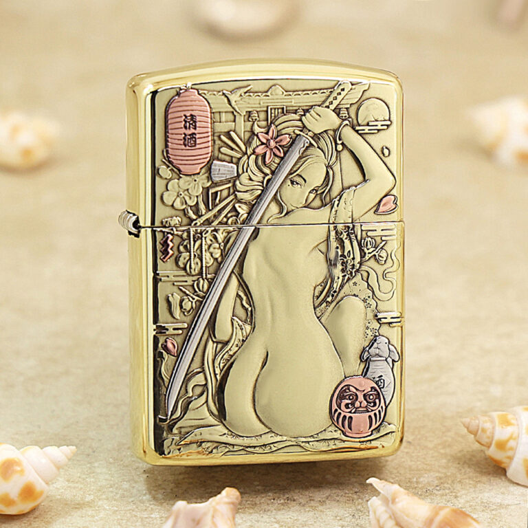 Gold Zippo-style lighter with engraved artwork of a woman holding a sword, surrounded by flowers and lanterns. Note: concise informative description, focuses on the image's meaning as a decorative lighter.