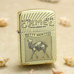 Gold Zippo-style lighter with Camel brand artwork, reading Nutty Menthol and featuring a camel illustration on a sunburst background.