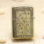 Gold-toned lighter engraved with a Game of Thrones map design on the front, ornate border surrounding the map.
