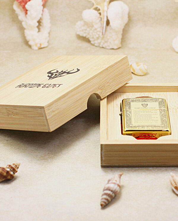 KZ196-06 Open wooden keepsake box revealing a gold-plated card inside a recessed slot, with seashells in the background.