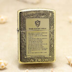 Gold-toned lighter engraved with Game of Thrones motifs and 'Night watcher swear' text on a parchment panel