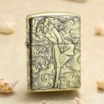1935 Varga Girl high-polish brass Zippo Armor lighter with arabesque engraving
