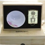 Buddha Relief lighter and white porcelain bowl in wooden gift box