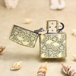 Open Skull and Roses brass Zippo Armor lighter front artwork