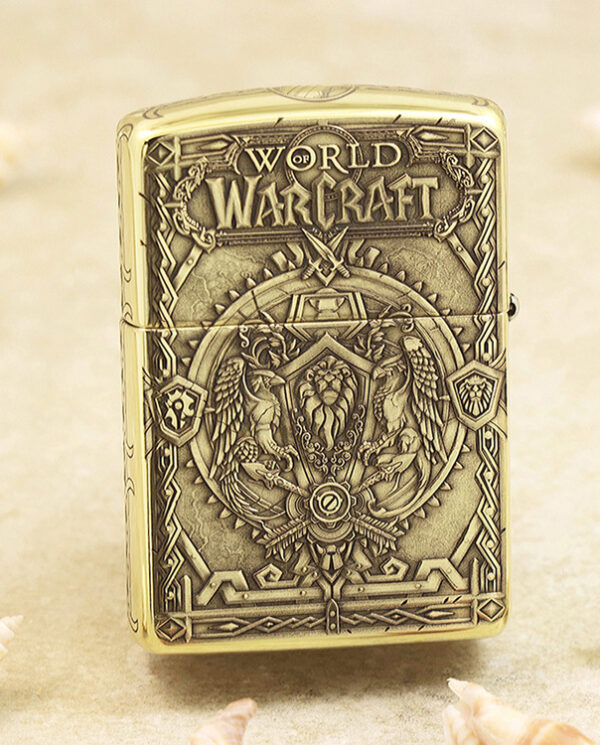 KZ217-01 Lighter with ornate World of Warcraft embossing and crest on a beige background.