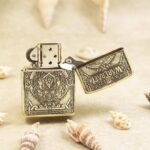 Open fantasy Zippo Armor lighter with World of Warcraft themed artwork