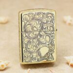 Arabesque Zippo Armor lighter with woman and skull engraved details
