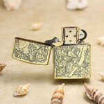 Open arabesque woman brass Zippo Armor lighter with scrollwork