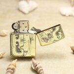 Open Zippo Armor lighter showing dragon and woman wraparound engraving