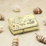 Dragon and woman brass Zippo Armor lighter reverse engraving detail