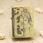 Dragon and woman brass Zippo Armor lighter with split engraved design