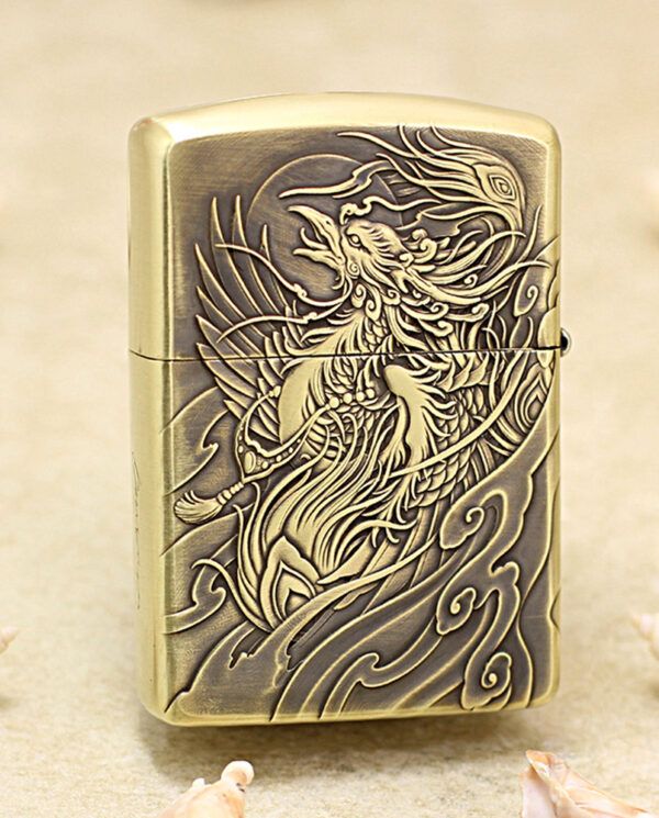 KZ229-01 Brass Zippo-style lighter with an ornate, engraved dragon and swirling wave patterns on the front surface.