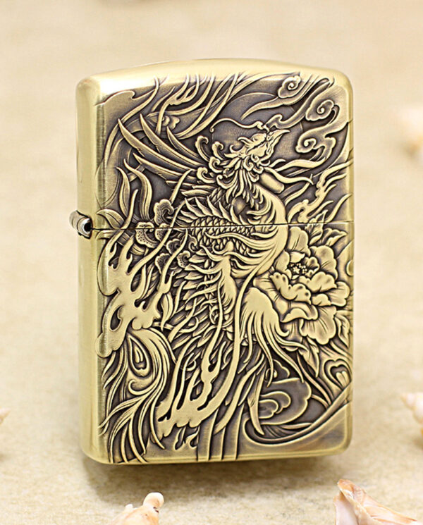 KZ229 Brass Zippo-style lighter with an intricate carved dragon and floral design on the front.