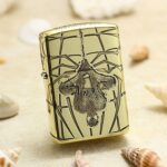 Spider-Man brass Zippo Armor lighter with engraved comic-style artwork