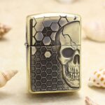 Dangerous Skull brass Zippo Armor lighter with black honeycomb engraving