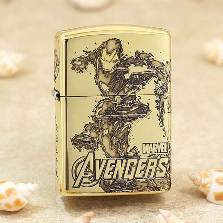 Gold-toned Zippo-style lighter featuring Marvel's Avengers and Iron Man artwork on the front.