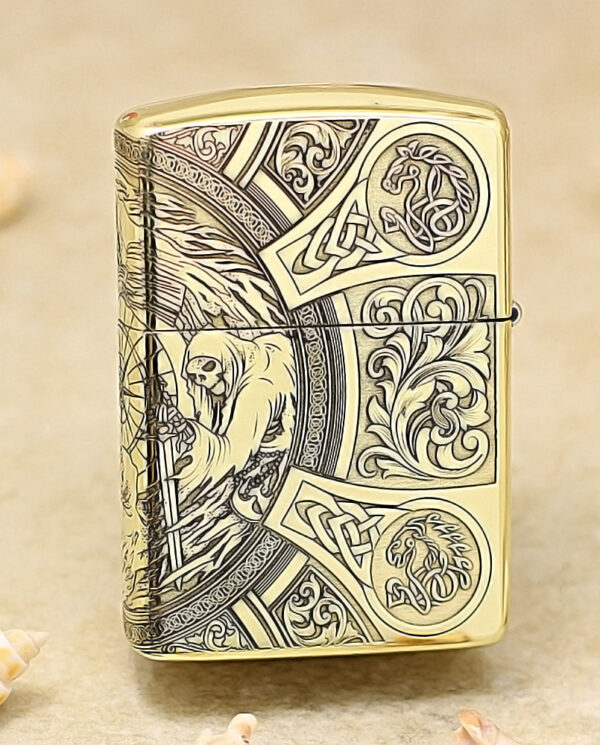 KZ245-01 Gold Zippo lighter with ornate medieval engraving, including a hooded figure and intricate knotwork.