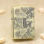 Four Horsemen brass Zippo Armor lighter with Celtic knot engraving