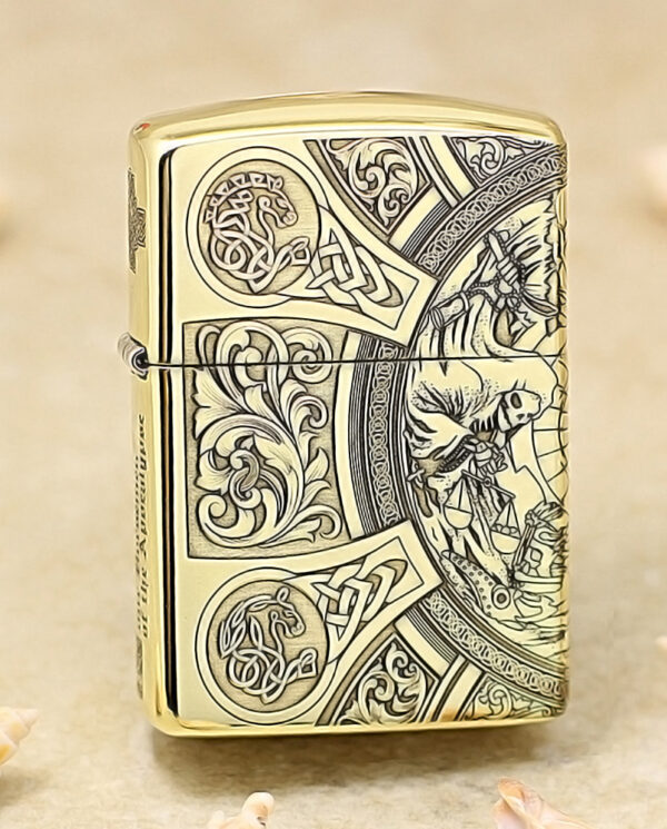 KZ245 Gold Zippo lighter with intricate Celtic knotwork and floral engravings on its surface.