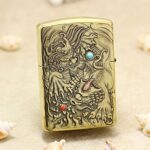 Ornate dragon Zippo Armor lighter with turquoise and ruby inlays