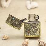 Open dragon brass Zippo Armor lighter with engraved inlay design