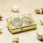 Dragon brass Zippo Armor lighter with colored stone accent details
