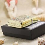 Dragon engraved Zippo Armor lighter displayed on presentation box