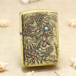 Dragon brass Zippo Armor lighter with turquoise eye and ruby accent