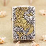 Gold Dragon silver-tone Zippo Armor lighter with arabesque engraving