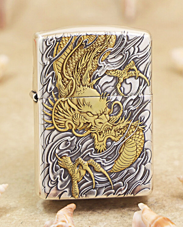 KZ282 Metal lighter with a gold dragon engraving on a silver, swirling background.