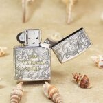 Open Varga Girl Windy Zippo Armor lighter showing reverse scrollwork