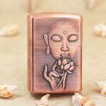 Zippo Copper-Tone Engraved Buddha Jacket Lighter – alternate view 1