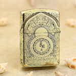 White Tara brass Zippo Armor lighter with circular lotus and floral ornament