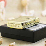 White Tara brass Zippo Armor lighter on original black box