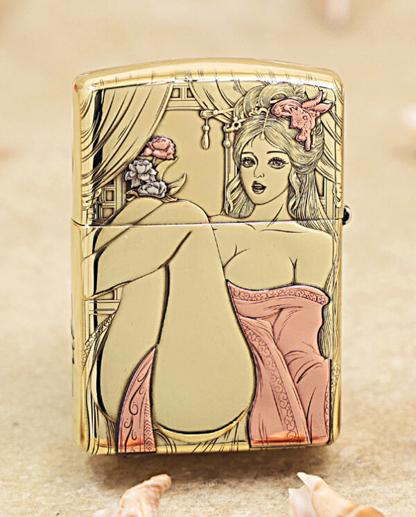 KZ426-01 Gold-colored lighter with a pin-up style illustration of a woman in a pink dress seated with legs raised, set against a curtained backdrop on the lid and body.