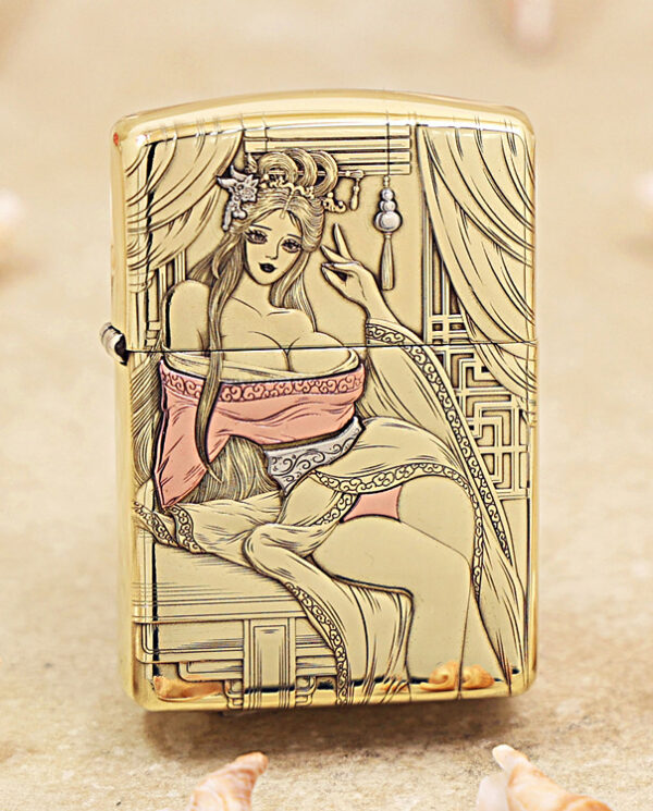 KZ426 Gold lighter with a vintage-style illustration of a seated woman draped in fabric, framed by curtains and decorative patterns.
