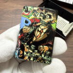 Zippo Wealth Skull full-wrap color lighter – alternate view 1