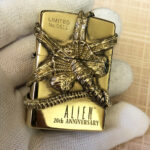 Open H.R. Giger Alien Emblem No. 1 brass Zippo lighter