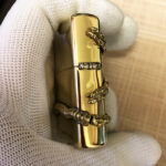 Alien Emblem No. 1 Zippo lighter base stamp close-up