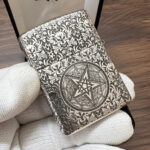 Son of Satan Pentagram sterling silver Zippo Armor lighter – reverse view showing a second pentagram medallion in ornate scrollwork