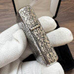 Son of Satan Pentagram sterling silver Zippo Armor lighter – hinge-side view with pentagram details and continuous floral engraving